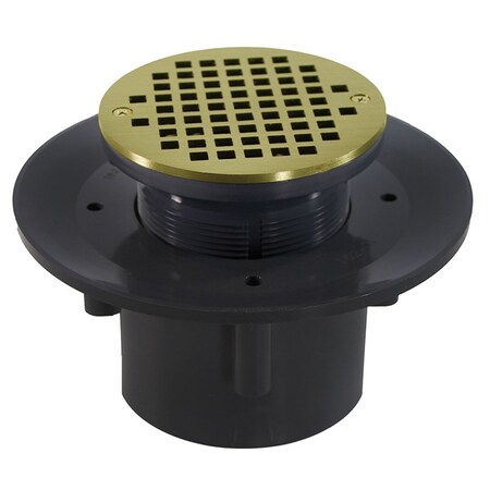 Jones Stephens 4in. Heavy Duty PVC Slab Drain Base with 3-1/2in. Plastic Spud and 5in. Polished Brass Strainer D49525